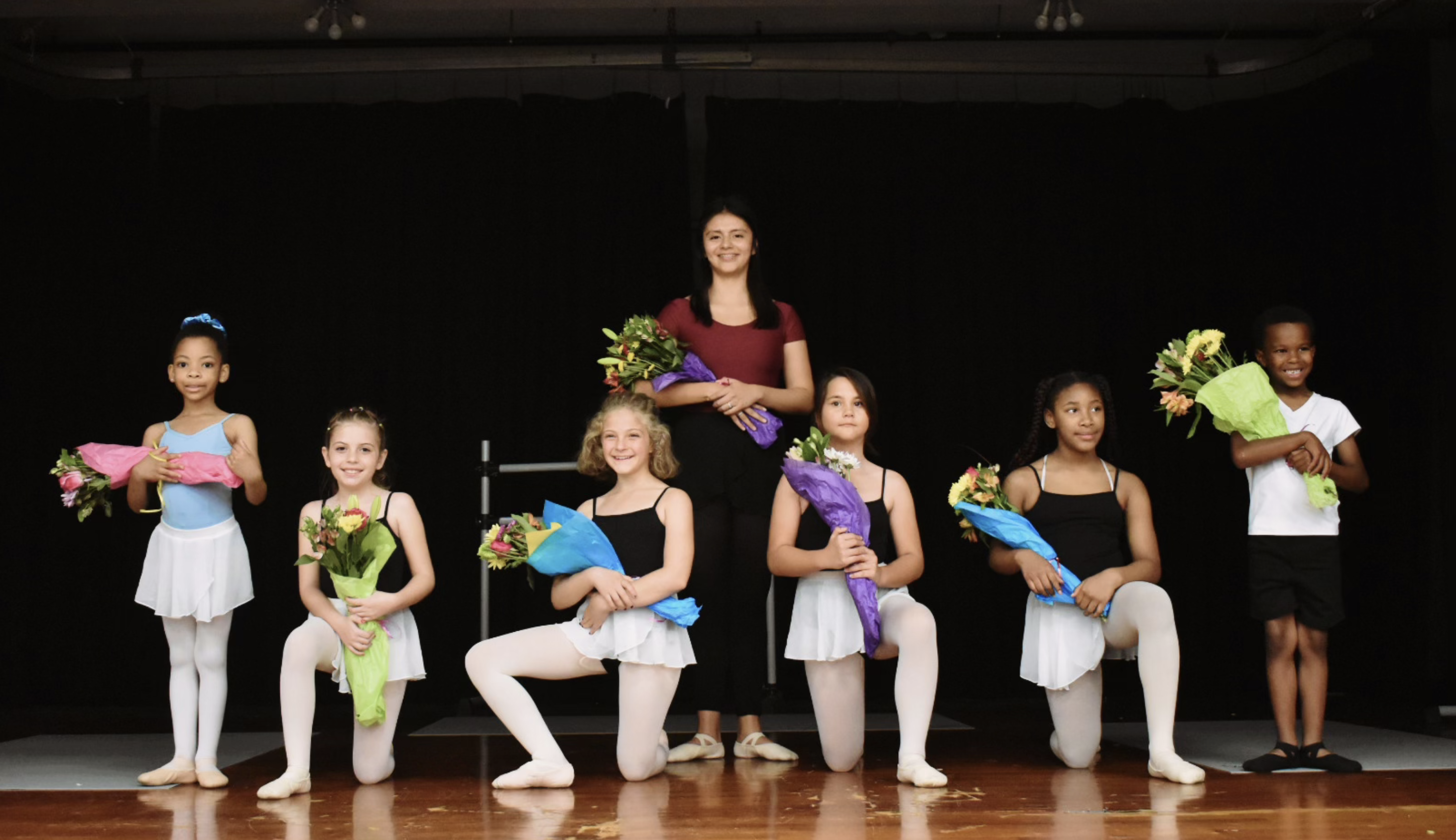 Children after performing for the Rotary Club of Downtown Ormond Beach with
                    director Fernanda Castillo