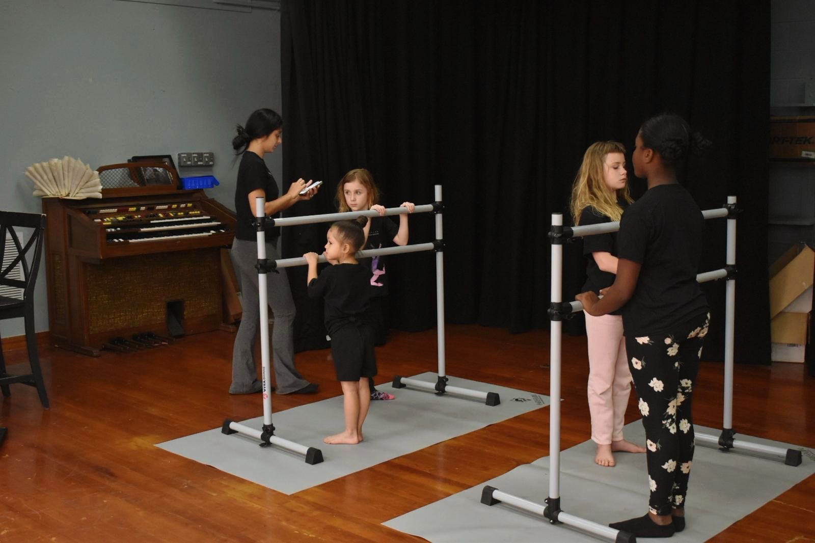 children in ballet class with director Fernanda Castillo